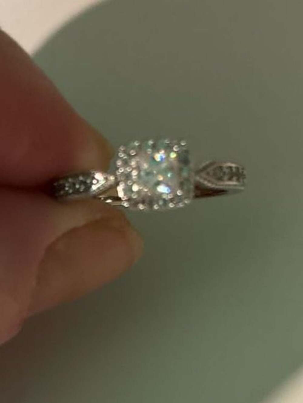 Mystery Set Engagement Ring With Split Crossed Shank -